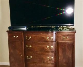 Large flat screen TV is SOLD, wooden cabinet available