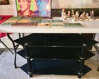 Corner black glass & metal TV stand, tiles are SOLD