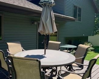 Nice patio set with 6 chairs and umbrella