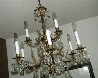 The chandelier will be for sale but I don't know to get it down. It's high over a stairway. It went up so it's got to come down!
