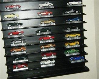 The cars and the display will be sold as a lot