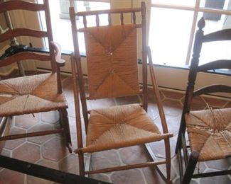 Antique Ladder Back and Rocking Chairs with Rush seats.