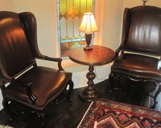 Wing Back Leather Armchairs.