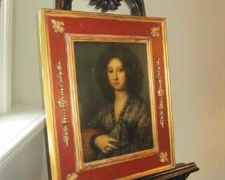 Framed art and Easel. 