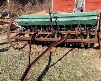We have farm equipment!  This Oliver grain feed is only $450