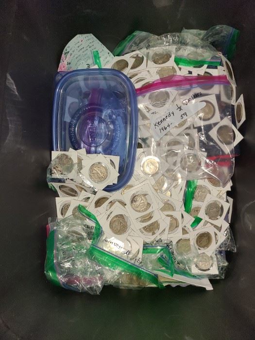 Large coin collection to include Morgan silver dollars, Peace silver dollars, Franklin half dollars, walking liberty half dollars and more.