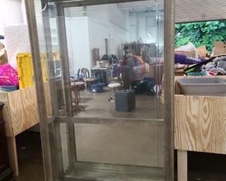 Large glass front curio cabinet with glass shelves