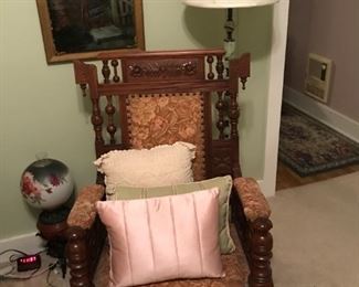 Heavily carved Victorian rocking chair