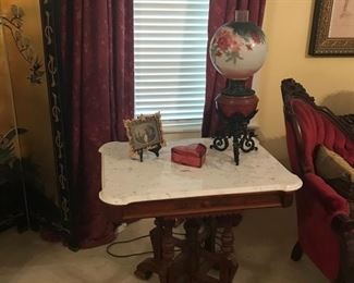 Antique parlor table with marble top