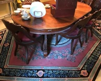 Reproduction dining Table with 4 leaves.  Made By: American Furniture Galleries in Birmingham, AL