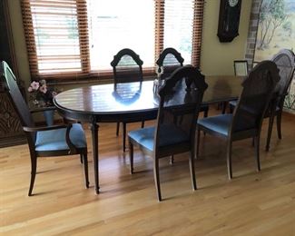 Dining room table with leafs, pads and 6 chairs