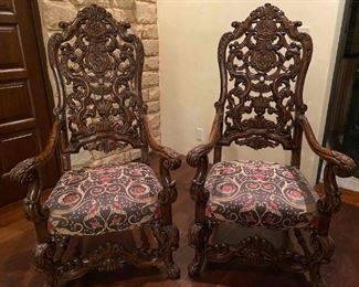 pair of Italian Donatello carved wood chairs