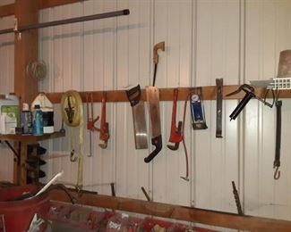 Display nearest hand tools saws tow ropes grease guns