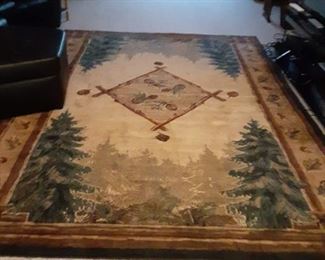 Area rug with a woodsy themed