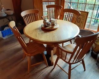 48 inch round oak dining table and 5 chairs