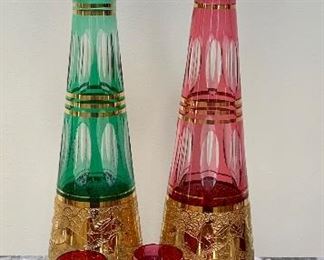 Item 168:  Red and Green Cut to Clear Bohemian Decanters and 4 glasses: $45