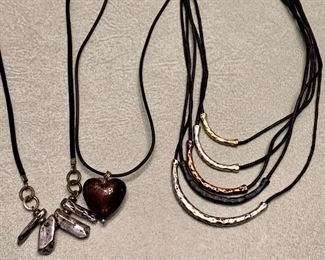 Lot #10:  Assorted Jewelry, Silver Ingot, Glass Heart and Layered Metal Necklace: $20