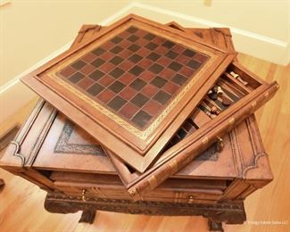 Maitland-Smith Game/Storage Side Table  $525
Leather bound top on mahogany cabriole legs with ball and claw feet. Top drawer pulls out to reveal chess/checkers, and backgammon boards. Game pieces present. Excellent condition. 24.5” wide, 24" deep, 27.5" high