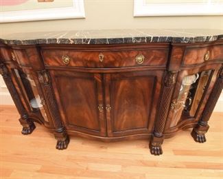 Henredon Natchez Marble-Top Sideboard  $825
Absolutely breathtaking book matched flame mahogany, with string black marble top. Glass doors on end cabinets to feature some of your favorite pieces. Excellent condition. 77ʺW × 23.5ʺD × 38.5ʺH