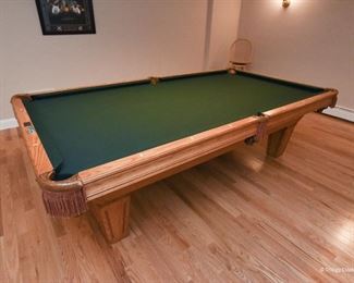 Brunswick Billiards Table - accepting offers. It's in excellent condition, large billiards size. Leather pockets. Includes balls and cues. 9'2" long  x 2'8" tall x 5' wide