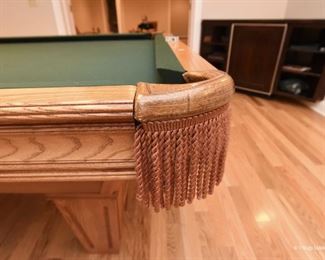Brunswick Billiards Table - accepting offers. It's in excellent condition, large billiards size. Leather pockets. Includes balls and cues. 9'2" long  x 2'8" tall x 5' wide