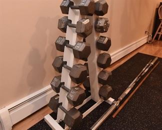 Solid Hex Dumbell Set with A-Frame Rack  $450
Six pairs of weights are 25lbs, 30lbs, 35lbs, 40lbs, 45lbs, 50lbs.