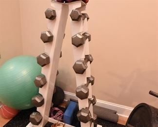 Small Hex Dumbell Set with A-Frame Rack  $175
Six pairs of weights 2.5lbs - 20lbs. Plus small .5lb and 1lb pink weights on top. 
