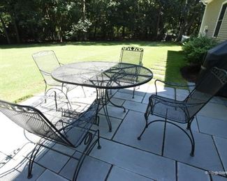 Oval Iron Table with Four Chairs  $275