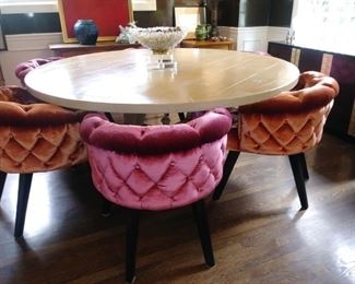Large round dining table, custom made jewel toned chairs