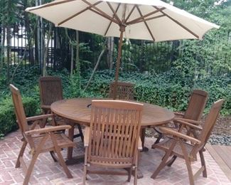 Large, round Teak table w/umbrella & 6 chairs