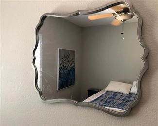 Nicely framed wall mirror