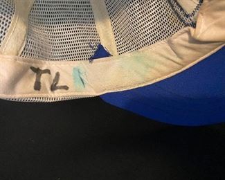 “T L” initials for Tom Landry -according to the family 