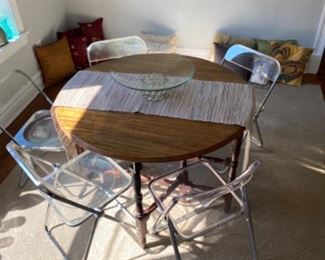 5 Castelli lucite folding chairs $250