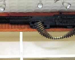 MOVIE PROP GUN USED IN 1998 FILM "SOLDIER"   STARRING KURT RUSSELL    NON FUNCTIONING                                                               REPLICA BROWNING M2 MACHINE TURRET GUN WITH 50 CALIBER SPENT CARTRIDGES                               NON FUNCTIONING RUBBER COMPOSITE MODEL