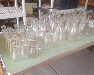 Dozens of vintage milk bottles from local dairies.  Batavia, Elmhurst, Hinsdale, and many others.