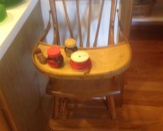 Vintage high chair...cannot be used for that purpose...decorative only