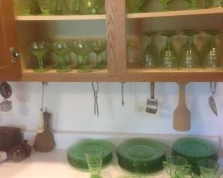 Sets of green depression glasses, plates, cups etc