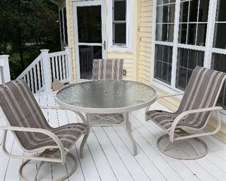 $150 METAL AND GLASS ROUND PATIO TABLE WITH 4 SWIVEL CHAIRS AND LOUNGER
TABLE MEASURES
49” DIA x 28”H