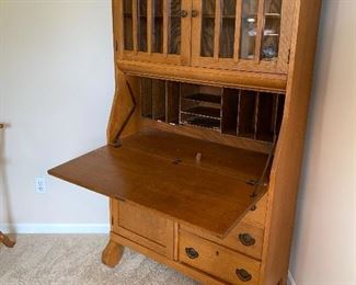$200 OAK SECRETARY DESK WITH HUTCH 
36”L x 15”D x 67”H 