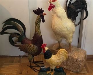 Roosters (L to R): painted metal, cast iron doorstop, life size with real feathers