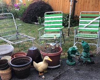 Planters, vintage lawn chairs, garden gnome