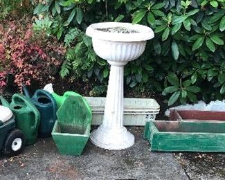 More planters, plastic watering cans