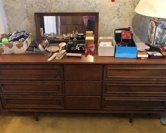 Mid-century 9-drawer walnut dresser (70”L, 19”D, 30”H) with matching wood frame mirror that attaches to back on left side (mirror itself is 28.5” x 43.5”)