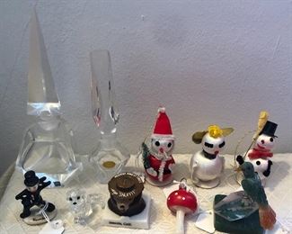 Crystal perfume bottles, Hummel chimney sweep, Swarovski crystal cat, Smokey the Bear “Snuffit” dashboard ashtray, vintage Xmas ornaments, hardstone bird
