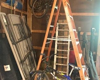 Ladders, Bikes and EZ up Shelter