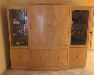 Matching large cabinet. The center section has a place for a television. This cabinet come apart in 4 section. Absolutely mint. This cabinet  matches the dining room table and chairs.  88 in. wide. The middle section is 73 in wide. Can come apart in sections. Priced at $575.00 
