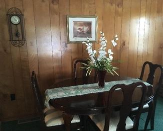 Dining Room Table with Chairs. Wall Clock. 