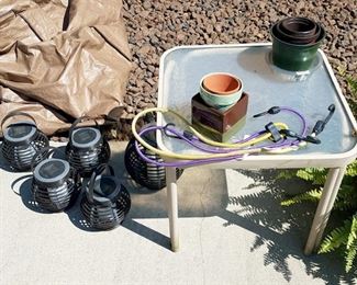 Solar lanterns $10 set of 5. Little glass patio table $7