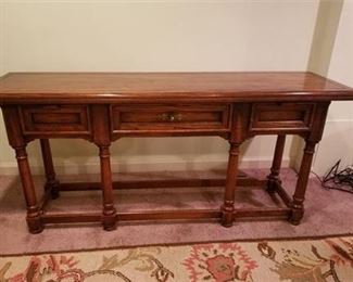 Lot 57
American Drew Dark Wood Sofa Table w/ Drawer