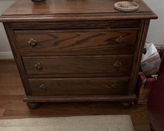 $225~  Three drawer end table
